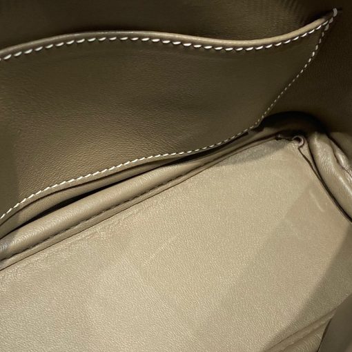 HERMÈS Bolide 1923 Mini. Authentic quality luxury bag crafted in genuine leather comes with authenticity card, dust bag and gift bag. Timeless Elegance, Unparalleled Convenience: The Bolide Bag – A Journey in Every Stitch. Created in 1923 with the discerning needs of elite drivers and seasoned long-distance travelers in mind, this globe-trotting bag effortlessly finds its place within any automobile trunk. Its iconic round-angled shape owes its origins to the zip fastener, a novel invention introduced to France by Émile Hermès in the late 1910s, and this innovative feature enables swift access to its contents. The Bolide bag is available in various sizes, including a travel-sized version, and a range of handbag options, offering both style and functionality to its fortunate owners.