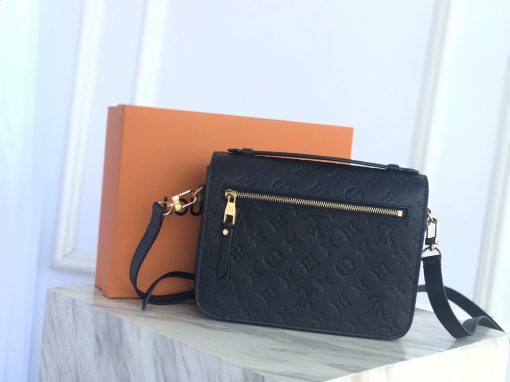 LOUIS VUITTON Pochette Métis Monogram Empreinte Bag. Authentic quality luxury bag crafted in genuine leather comes with authenticity card, dust bag and gift bag. Elegance Redefined in Every Moment. The Pochette Métis handbag seamlessly combines the timeless elegance of the classic satchel silhouette with a contemporary twist. Expertly crafted from the finest Monogram Empreinte leather, this desirable model showcases an enchanting S-lock closure, reminiscent of the storied House trunks. Its versatility knows no bounds, as it effortlessly transitions from day to night, effortlessly blending style and practicality. With its compact yet surprisingly spacious design, it allows you to effortlessly carry all your essentials. Additionally, it boasts a fashionable top handle and a detachable strap, allowing for both shoulder and cross-body wear, further enhancing its allure.