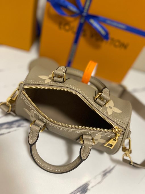 LOUIS VUITTON Papillon BB Bag. Authentic quality luxury bag crafted in genuine leather comes with authenticity card, dust bag and gift bag. Style Meets Versatility: Discover the Miniature Marvel of the Papillon BB Bag! The House's iconic Papillon bag can now be found in a charming BB size. Made from premium Monogram Empreinte leather, this delightful two-tone design showcases a large embossed pattern and comes with a cute matching coin purse. With its broad, detachable jacquard strap and two elegant Toron top handles, the bag offers multiple fashionable carrying options.