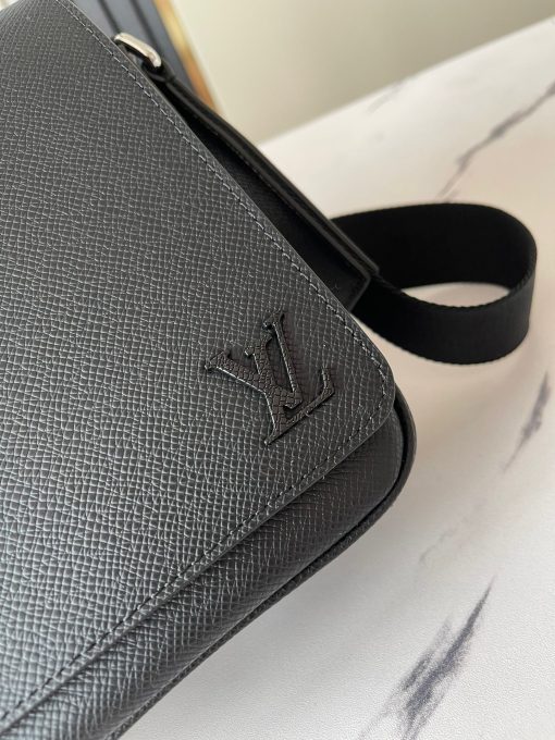 LOUIS VUITTON District Small PM. Authentic quality luxury bag crafted in genuine leather comes with authenticity card, dust bag and gift bag. Style and Functionality Meet. The District PM messenger bag is a superb choice for daily use, thanks to its stylish rectangular shape and spacious interior. Crafted from durable Taiga leather, it boasts a convenient zipped back pocket and an adjustable nylon strap that allows for versatile carrying. Furthermore, the strap is equipped with a D-ring, perfect for hanging keys or a wallet.