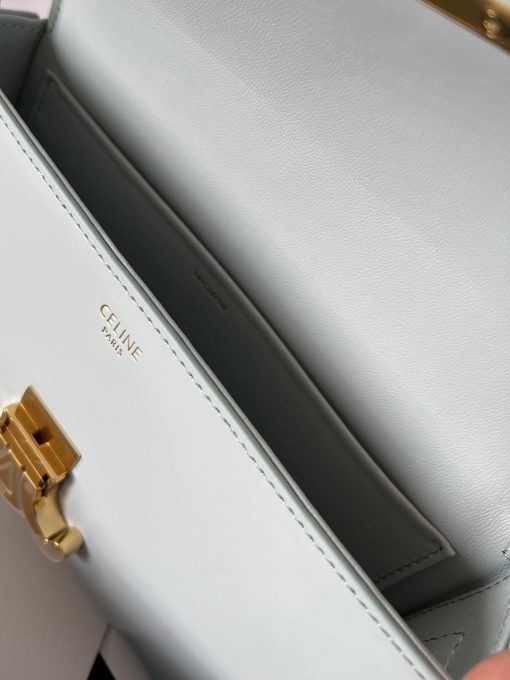 CELINE Claude Shoulder Bag. Authentic quality luxury bag crafted in genuine leather comes with authenticity card, dust bag and gift bag. Embrace EleganceElegance Unveiled: Embrace Timeless Luxury Every Day. The bag boasts a beautifully minimalist design, with the spotlight shining on its exquisite leather craftsmanship. Its center is adorned with the elegant Triomphe Metallic Closure in gleaming gold hardware, where the iconic double C symbolizes Celine's timeless style. Meticulously crafted from durable and robust calfskin leather, this versatile bag effortlessly transitions from special occasions to everyday wear, making it a chic and functional choice for any setting, including the workplace.