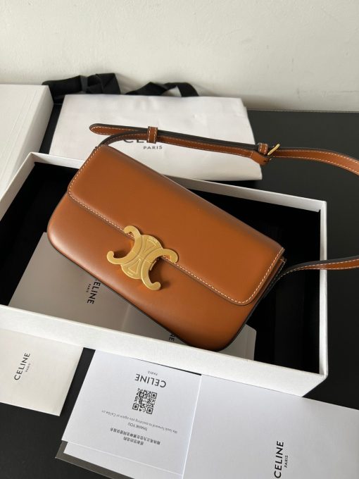 CELINE Claude Shoulder Bag. Authentic quality luxury bag crafted in genuine leather comes with authenticity card, dust bag and gift bag. Embrace EleganceElegance Unveiled: Embrace Timeless Luxury Every Day. The bag boasts a beautifully minimalist design, with the spotlight shining on its exquisite leather craftsmanship. Its center is adorned with the elegant Triomphe Metallic Closure in gleaming gold hardware, where the iconic double C symbolizes Celine's timeless style. Meticulously crafted from durable and robust calfskin leather, this versatile bag effortlessly transitions from special occasions to everyday wear, making it a chic and functional choice for any setting, including the workplace.