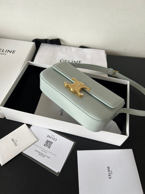 CELINE Claude Shoulder Bag. Authentic quality luxury bag crafted in genuine leather comes with authenticity card, dust bag and gift bag. Embrace EleganceElegance Unveiled: Embrace Timeless Luxury Every Day. The bag boasts a beautifully minimalist design, with the spotlight shining on its exquisite leather craftsmanship. Its center is adorned with the elegant Triomphe Metallic Closure in gleaming gold hardware, where the iconic double C symbolizes Celine's timeless style. Meticulously crafted from durable and robust calfskin leather, this versatile bag effortlessly transitions from special occasions to everyday wear, making it a chic and functional choice for any setting, including the workplace.