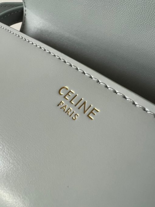 CELINE Claude Shoulder Bag. Authentic quality luxury bag crafted in genuine leather comes with authenticity card, dust bag and gift bag. Embrace EleganceElegance Unveiled: Embrace Timeless Luxury Every Day. The bag boasts a beautifully minimalist design, with the spotlight shining on its exquisite leather craftsmanship. Its center is adorned with the elegant Triomphe Metallic Closure in gleaming gold hardware, where the iconic double C symbolizes Celine's timeless style. Meticulously crafted from durable and robust calfskin leather, this versatile bag effortlessly transitions from special occasions to everyday wear, making it a chic and functional choice for any setting, including the workplace.