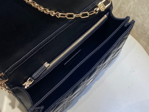 DIOR Miss Dior Top Handle Bag. Authentic quality luxury bag crafted in genuine leather comes with authenticity card, dust bag and gift bag. Your Day to Evening Essential. Elegance in Every Detail. Introducing the latest addition to the Cruise 2024 collection, the Miss Dior Top Handle bag embodies an exquisite blend of sophistication and functionality. Meticulously fashioned from luxurious black lambskin adorned with meticulous Cannage stitching, this bag showcases a gracefully adorned flap adorned by a captivating D.I.O.R. charm. Beneath this flap, you'll discover two spacious compartments and a secure zipped pouch, designed to effortlessly accommodate all your essentials, whether it's day or night. The signature Top Handle of this bag is both elegant and versatile, featuring a removable chain strap with a leather insert. This thoughtful design allows you to carry it comfortably in hand, wear it gracefully over your shoulder, or effortlessly sling it across your body for a stylish and adaptable look.