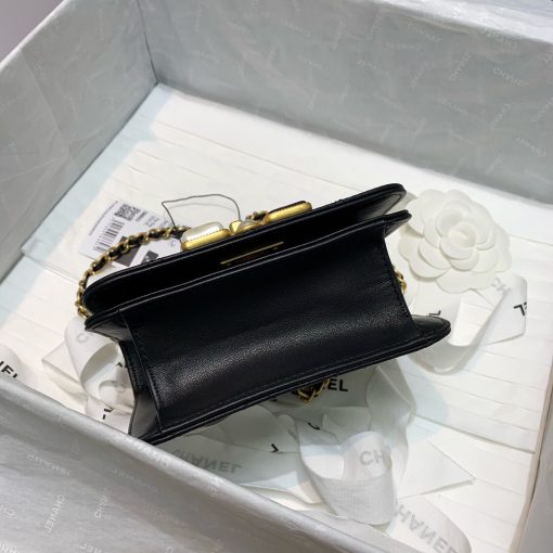 CHANEL Small Flap Bag with Crystal Pearls and Resin. Authentic quality luxury bag crafted in genuine leather comes with authenticity card, dust bag and gift bag. Captivating Complexity: Embrace Subtle Glamour with Chanel's Bejeweled Small Flap Bag. Chanel has unveiled an exquisite addition to their Fall-Winter 2020/21 collection: the Small Flap Bag, now adorned with dazzling jewels. This delicately glamorous bag showcases the elegance of faux pearls and Chanel's renowned Gripoix, crafted from poured glass, beautifully embellishing its clasp.