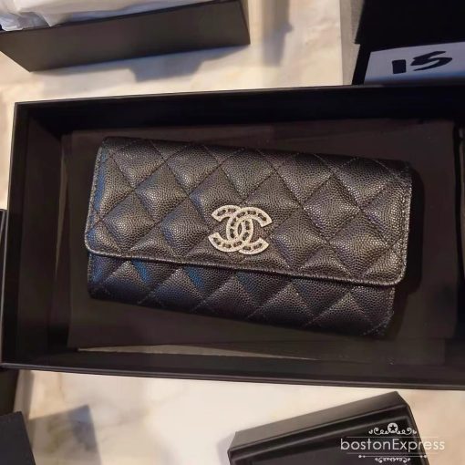 CHANEL CC Logo Flap Wallet. Authentic quality luxury bag crafted in genuine leather comes with authenticity card, dust bag and gift bag. Luxury meets practicality. Introducing the exquisite CHANEL wallet, meticulously fashioned with opulent quilted grained calfskin embellished by the iconic CC logo. Unlocking its magnetic allure reveals a sumptuous leather interior adorned with convenient card slots and a secure zippered compartment.