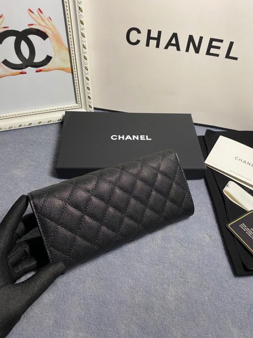 CHANEL CC Logo Flap Wallet. Authentic quality luxury bag crafted in genuine leather comes with authenticity card, dust bag and gift bag. Luxury meets practicality. Introducing the exquisite CHANEL wallet, meticulously fashioned with opulent quilted grained calfskin embellished by the iconic CC logo. Unlocking its magnetic allure reveals a sumptuous leather interior adorned with convenient card slots and a secure zippered compartment.