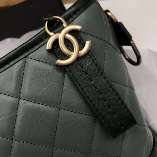 CHANEL Gabrielle Leather Hobo Bag. Authentic quality luxury bag crafted in genuine leather comes with authenticity card, dust bag and gift bag. Embodying the Future of Chanel with a Bold and Unforgettable Style. In an exclusive Chanel video, Karl Lagerfeld expressed his belief that the latest bag style, the Gabrielle, pays homage to Chanel's founder, Gabrielle Bonheur "Coco" Chanel. Lagerfeld explained that while she was known as Coco, her real name was Gabrielle, a fitting name for a handbag that embodies all the signature codes of Chanel. We wholeheartedly agree with Lagerfeld's sentiment. The Gabrielle is undeniably "perfectly Chanel", but with a fresh and bold twist. The inspiration behind the Chanel Gabrielle bag can be traced to virtual reality glasses and the binocular cases that men used to carry over their shoulders at the racecourse. While the bag incorporates iconic Chanel elements like quilting and a prominent CC logo, it has a distinct futuristic edge, as evident in its boxy shape. As per Chanel's literature, carrying the Gabrielle bag offers a truly unique experience. Its double straps can be effortlessly draped over the head, mimicking the ease of slipping on a sweater, and nonchalantly encircled around the neck and shoulder, resembling a long necklace. Karl Lagerfeld even emphasizes that the bag's strong aesthetic is reflective of the individuals who represent it, possessing equally strong looks and personalities.