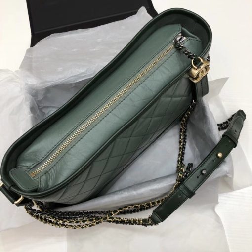 CHANEL Gabrielle Leather Hobo Bag. Authentic quality luxury bag crafted in genuine leather comes with authenticity card, dust bag and gift bag. Embodying the Future of Chanel with a Bold and Unforgettable Style. In an exclusive Chanel video, Karl Lagerfeld expressed his belief that the latest bag style, the Gabrielle, pays homage to Chanel's founder, Gabrielle Bonheur "Coco" Chanel. Lagerfeld explained that while she was known as Coco, her real name was Gabrielle, a fitting name for a handbag that embodies all the signature codes of Chanel. We wholeheartedly agree with Lagerfeld's sentiment. The Gabrielle is undeniably "perfectly Chanel", but with a fresh and bold twist. The inspiration behind the Chanel Gabrielle bag can be traced to virtual reality glasses and the binocular cases that men used to carry over their shoulders at the racecourse. While the bag incorporates iconic Chanel elements like quilting and a prominent CC logo, it has a distinct futuristic edge, as evident in its boxy shape. As per Chanel's literature, carrying the Gabrielle bag offers a truly unique experience. Its double straps can be effortlessly draped over the head, mimicking the ease of slipping on a sweater, and nonchalantly encircled around the neck and shoulder, resembling a long necklace. Karl Lagerfeld even emphasizes that the bag's strong aesthetic is reflective of the individuals who represent it, possessing equally strong looks and personalities.