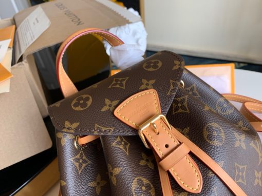 LOUIS VUITTON Montsouris Backpack. Authentic quality luxury bag crafted in genuine leather comes with authenticity card, dust bag and gift bag. Effortlessly stylish, the epitome of sophistication. Introducing a sophisticated addition to our collection, the exquisite backpack crafted from luxurious Monogram canvas and fine cowhide leather. This impeccable piece effortlessly seals with the iconic Louis Vuitton buckle and refined leather drawstrings. Both practical and spacious, its interior flaunts ample room while an external zippered pocket offers convenient storage. The top handle and adjustable leather straps create countless options for carrying, ensuring maximum versatility.