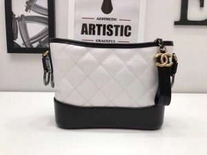 CHANEL Gabrielle Leather Hobo Bag. Authentic quality luxury bag crafted in genuine leather comes with authenticity card, dust bag and gift bag. Embodying the Future of Chanel with a Bold and Unforgettable Style. In an exclusive Chanel video, Karl Lagerfeld expressed his belief that the latest bag style, the Gabrielle, pays homage to Chanel's founder, Gabrielle Bonheur "Coco" Chanel. Lagerfeld explained that while she was known as Coco, her real name was Gabrielle, a fitting name for a handbag that embodies all the signature codes of Chanel. We wholeheartedly agree with Lagerfeld's sentiment. The Gabrielle is undeniably "perfectly Chanel", but with a fresh and bold twist. The inspiration behind the Chanel Gabrielle bag can be traced to virtual reality glasses and the binocular cases that men used to carry over their shoulders at the racecourse. While the bag incorporates iconic Chanel elements like quilting and a prominent CC logo, it has a distinct futuristic edge, as evident in its boxy shape. As per Chanel's literature, carrying the Gabrielle bag offers a truly unique experience. Its double straps can be effortlessly draped over the head, mimicking the ease of slipping on a sweater, and nonchalantly encircled around the neck and shoulder, resembling a long necklace. Karl Lagerfeld even emphasizes that the bag's strong aesthetic is reflective of the individuals who represent it, possessing equally strong looks and personalities. - KRIS + KIKO CHANEL Gabrielle Leather Hobo Bag. Original Quality Bag including gift box, care book, dust bag, authenticity card. As stated by Karl Lagerfeld in an exclusive Chanel video, this latest bag style is really meant to pay homage Chanel’s founder, Gabrielle Bonheur “Coco” Chanel: “Everyone called her Coco but her real name was Gabrielle. It’s the perfect name for a handbag that has all the codes of Chanel.” We agree with Lagerfeld. The Gabrielle hits the mark on everything “perfectly Chanel”, with a fresh, bold twist.” The Chanel Gabrielle bag is inspired by virtual reality glasses and the binocular cases men used to wear over their shoulders at the racecourse. The bag features other iconic Chanel elements like quilting and a big CC logo, but overall this bag is supposed to have a futuristic edge as seen by its boxy shape. According to literature from Chanel, the experience of carrying the Gabrielle bag is truly unique. Its double straps can be passed over the head, like a sweater, and circled around the neck and shoulder nonchalantly, like a long necklace. Karl Lagerfeld even goes as far to state that “the handbag has a strong look, so the people who represent it have strong looks and personalities.”