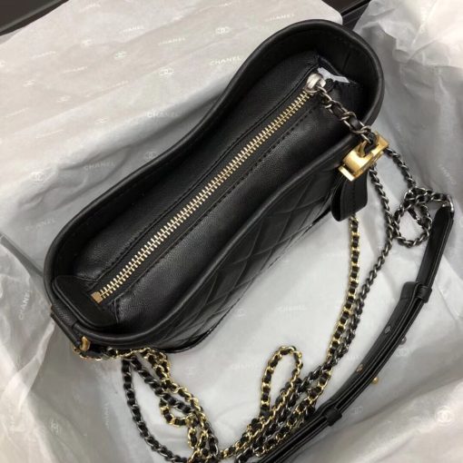 CHANEL Gabrielle Leather Hobo Bag. Authentic quality luxury bag crafted in genuine leather comes with authenticity card, dust bag and gift bag. Embodying the Future of Chanel with a Bold and Unforgettable Style. In an exclusive Chanel video, Karl Lagerfeld expressed his belief that the latest bag style, the Gabrielle, pays homage to Chanel's founder, Gabrielle Bonheur "Coco" Chanel. Lagerfeld explained that while she was known as Coco, her real name was Gabrielle, a fitting name for a handbag that embodies all the signature codes of Chanel. We wholeheartedly agree with Lagerfeld's sentiment. The Gabrielle is undeniably "perfectly Chanel", but with a fresh and bold twist. The inspiration behind the Chanel Gabrielle bag can be traced to virtual reality glasses and the binocular cases that men used to carry over their shoulders at the racecourse. While the bag incorporates iconic Chanel elements like quilting and a prominent CC logo, it has a distinct futuristic edge, as evident in its boxy shape. As per Chanel's literature, carrying the Gabrielle bag offers a truly unique experience. Its double straps can be effortlessly draped over the head, mimicking the ease of slipping on a sweater, and nonchalantly encircled around the neck and shoulder, resembling a long necklace. Karl Lagerfeld even emphasizes that the bag's strong aesthetic is reflective of the individuals who represent it, possessing equally strong looks and personalities.