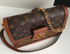 LOUIS VUITTON Dauphine MM Shoulder Bag. Authentic quality luxury bag crafted in genuine leather comes with authenticity card, dust bag and gift bag. A Modern Must-Have. Nicolas Ghesquière presents a captivating addition to the Spring-Summer 2019 collection: the Dauphine Mini handbag. This charming and sleek design is exquisitely crafted using Monogram and Monogram Reverse canvas, elegantly accentuated with smooth tan calfskin trim. The striking LV lock and leather smart strap bring a contemporary touch to this iconic piece, perfectly sized for seamless transitions from day to night. - KRIS + KIKO LOUIS VUITTON Dauphine MM Shoulder Bag. Authentic quality luxury bag crafted in genuine leather comes with authenticity card, dust bag and gift bag. A Modern Must-Have. Nicolas Ghesquière presents a captivating addition to the Spring-Summer 2019 collection: the Dauphine Mini handbag. This charming and sleek design is exquisitely crafted using Monogram and Monogram Reverse canvas, elegantly accentuated with smooth tan calfskin trim. The striking LV lock and leather smart strap bring a contemporary touch to this iconic piece, perfectly sized for seamless transitions from day to night.