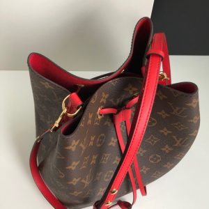 LOUIS VUITTON 'NéoNoé' Bucket Bag. Authentic quality luxury bag crafted in genuine leather comes with authenticity card, dust bag and gift bag. Effortlessly carrying the legacy of elegance and style. Originally created in 1932 for the sole purpose of carrying Champagne bottles, the Noé bag makes a fashionable comeback with a modern twist. Presenting the NéoNoé, a stunning bucket bag crafted from supple Monogram canvas adorned with vibrant calf-leather accents. Additionally, it features an adjustable strap that can be extended for a trendy cross-body carrying style. - KRIS + KIKO LOUIS VUITTON 'NéoNoé' Bucket Bag. Original Quality Bag including gift box, care book, dust bag, authenticity card. Designed in 1932 to transport bottles of Champagne, the Noé returns as the NéoNoé, an on-trend bucket bag in supple Monogram canvas with colorful calf-leather accents and an adjustable strap that lengthens for a modern, cross-body carry.