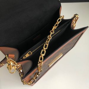 LOUIS VUITTON Dauphine MM Shoulder Bag. Authentic quality luxury bag crafted in genuine leather comes with authenticity card, dust bag and gift bag. A Modern Must-Have. Nicolas Ghesquière presents a captivating addition to the Spring-Summer 2019 collection: the Dauphine Mini handbag. This charming and sleek design is exquisitely crafted using Monogram and Monogram Reverse canvas, elegantly accentuated with smooth tan calfskin trim. The striking LV lock and leather smart strap bring a contemporary touch to this iconic piece, perfectly sized for seamless transitions from day to night. - KRIS + KIKO LOUS VUITTON Dauphine MM Shoulder Bag. Original Quality Bag. Authentic Style. Genuine Calf Leather. Metal Hardware. Authentic Packaging. Original Quality Dust Bag. For Spring-Summer 2019 Nicolas Ghesquière unveils a new must-have: the Dauphine Mini handbag. This adorable compact model is crafted from Monogram and Monogram Reverse canvas, trimmed with smooth tan calfskin. The high-shine LV lock and leather smart strap add a modern twist to this signature piece, which is perfectly sized for day-to-evening wear.