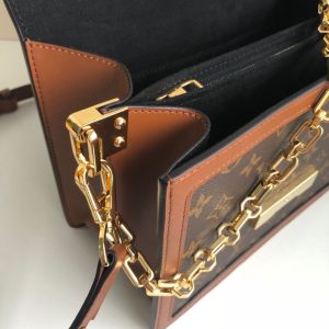 LOUIS VUITTON Dauphine MM Shoulder Bag. Authentic quality luxury bag crafted in genuine leather comes with authenticity card, dust bag and gift bag. A Modern Must-Have. Nicolas Ghesquière presents a captivating addition to the Spring-Summer 2019 collection: the Dauphine Mini handbag. This charming and sleek design is exquisitely crafted using Monogram and Monogram Reverse canvas, elegantly accentuated with smooth tan calfskin trim. The striking LV lock and leather smart strap bring a contemporary touch to this iconic piece, perfectly sized for seamless transitions from day to night. - KRIS + KIKO LOUIS VUITTON Dauphine MM Shoulder Bag. Authentic quality luxury bag crafted in genuine leather comes with authenticity card, dust bag and gift bag. A Modern Must-Have. Nicolas Ghesquière presents a captivating addition to the Spring-Summer 2019 collection: the Dauphine Mini handbag. This charming and sleek design is exquisitely crafted using Monogram and Monogram Reverse canvas, elegantly accentuated with smooth tan calfskin trim. The striking LV lock and leather smart strap bring a contemporary touch to this iconic piece, perfectly sized for seamless transitions from day to night.