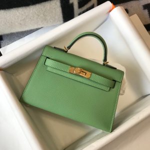 HERMÈS 'Mini Kelly’ Sellier II Leather Shoulder Bag. Authentic quality luxury bag crafted in genuine leather comes with authenticity card, dust bag and gift bag. Style meets functionality. Hermès has ingeniously crafted the ideal Kelly bag that strikes the perfect balance. Slightly larger than the sought-after baby Kelly Micro and smaller than the timeless classic Kelly, this exquisite creation effortlessly accommodates our modern gadgets, including our beloved smartphones, without compromising its charming and petite character. While it may not serve the exact purpose that earned it its name (as Grace Kelly famously concealed her baby bump with the bag in the 1950s), we wholeheartedly cherish it nonetheless. Today, embracing and showcasing our modern baby bellies is the new trend, after all. - KRIS + KIKO HERMÈS 'Mini Kelly’ Sellier II Leather Shoulder Bag. Original Quality Bag. Metal toned Hardware. HERMÈS Sales Box and Dust Bag. Booklet, Authenticity Card, Payment Slip. Lock, keys, clochette. Hermès has created the perfect Kelly. Just a little bigger than the covetable baby Kelly Micro and smaller than the beautifully classic Kelly, it's been made to fit all our modern contraptions—smart phones included—while maintaining its petite insouciance. It may not be able to be utilized the same way it got its name (Grace Kelly famously held the bag over her body in photos to conceal her baby bump in the 1950s), but we love it just the same. Modern baby bellies are for flaunting, anyway.