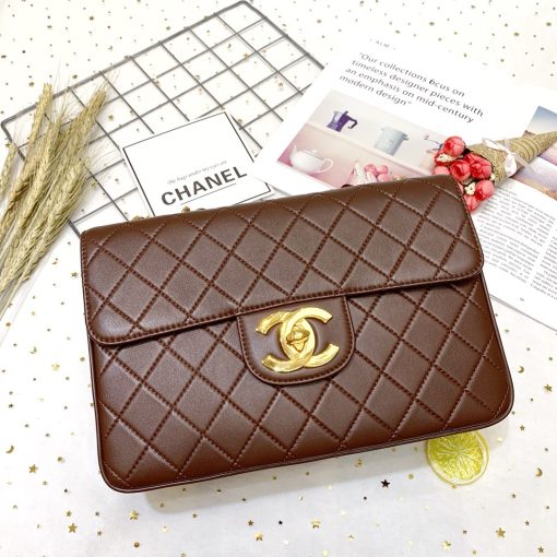 CHANEL Classic Flap Jumbo Bag. Authentic quality luxury bag crafted in genuine leather comes with authenticity card, dust bag and gift bag. Classic elegance with a modern twist. Introducing the Chanel Classic Mademoiselle Chain Lambskin Flap Bag, an essential item that embodies the essence of Chanel. This timeless piece features the iconic CC buckle and is beautifully enhanced with gold-plated Mademoiselle Chain straps. With this reinterpretation of the classic design, you can wear it as a clutch, effortlessly drape it over your shoulder, or enjoy the convenience of going hands-free with the option of wearing it cross-body.