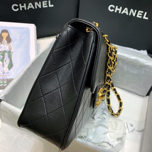 CHANEL Classic Flap Jumbo Bag. Authentic quality luxury bag crafted in genuine leather comes with authenticity card, dust bag and gift bag. Classic elegance with a modern twist. Introducing the Chanel Classic Mademoiselle Chain Lambskin Flap Bag, an essential item that embodies the essence of Chanel. This timeless piece features the iconic CC buckle and is beautifully enhanced with gold-plated Mademoiselle Chain straps. With this reinterpretation of the classic design, you can wear it as a clutch, effortlessly drape it over your shoulder, or enjoy the convenience of going hands-free with the option of wearing it cross-body.