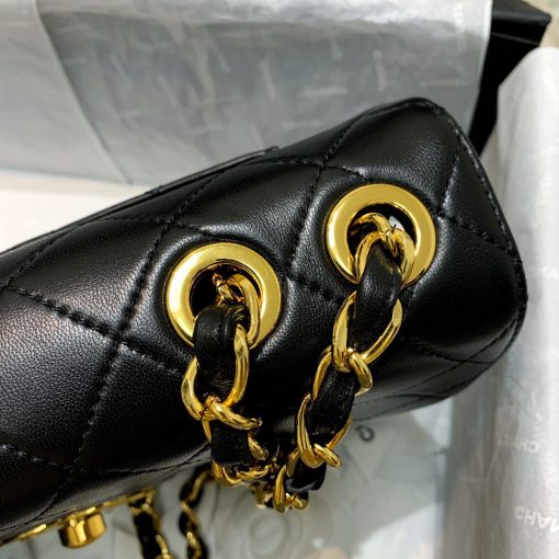 CHANEL Classic Flap Jumbo Bag. Authentic quality luxury bag crafted in genuine leather comes with authenticity card, dust bag and gift bag. Classic elegance with a modern twist. Introducing the Chanel Classic Mademoiselle Chain Lambskin Flap Bag, an essential item that embodies the essence of Chanel. This timeless piece features the iconic CC buckle and is beautifully enhanced with gold-plated Mademoiselle Chain straps. With this reinterpretation of the classic design, you can wear it as a clutch, effortlessly drape it over your shoulder, or enjoy the convenience of going hands-free with the option of wearing it cross-body.