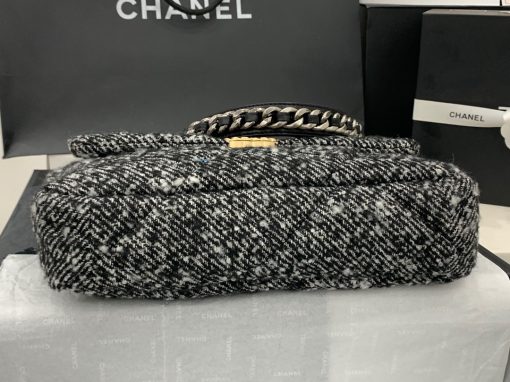 CHANEL 19 Flap Bag. Authentic quality luxury bag crafted in genuine leather comes with authenticity card, dust bag and gift bag. Effortlessly timeless, delightfully on-trend. For an everlasting touch of Parisian elegance, investing in a Chanel flap bag is the ultimate choice. However, if you're looking for a bag that seamlessly blends timeless appeal with current trends, then the Chanel 19 Flap Bag is the absolute pinnacle and arguably the most coveted bag in the world right now. Crafted with meticulous attention to detail using exquisite Tweed Fibres and adorned with the iconic two-toned Chanel 19 hardware in both Gold and Ruthenium, this icon is undeniably a striking fashion statement. The interwoven chain gracefully drapes over your shoulder or can be doubled up on your arm, exuding a sophisticated charm. Under the visionary craftsmanship of Karl Lagerfeld, Chanel stays true to its heritage by introducing classic quilted bags with a contemporary edge. Versatility is the name of the game as this exquisite piece effortlessly complements any ensemble you can imagine.