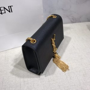 SAINT LAURENT Small 'Kate' Bag with Tassel. Authentic quality luxury bag crafted in genuine leather comes with authenticity card, dust bag and gift bag. Discover the epitome of elegance. Elegantly designed, the Monogram SAINT LAURENT bag is embellished with a sleek curb chain, interlocking YSL initials in metal, and a shimmering metallic tassel. Meticulously crafted from supple leather, the Kate shoulder bag by Saint Laurent showcases a distinctive YSL monogram plaque and a dangling tassel detail on the front, adding an exquisite touch. This exquisite accessory is ideal for a night out, serving as the perfect go-to option. It features a chain shoulder strap, a secure foldover top with magnetic closure, a spacious main compartment, an internal slip pocket, a logo patch, a logo stamp, and exquisite metal hardware for a sophisticated finish. - KRIS + KIKO SAINT LAURENT Small 'Kate' Bag with Tassel. Original Quality Bag including gift box, care book, dust bag, authenticity card. Monogram Saint Laurent bag adorned with a curb chain, interlocking YSL initials in metal, and a metallic tassel. Crafted from leather, this Kate shoulder bag from Saint Laurent is decorated with a signature YSL monogram plaque and a hanging tassel detail to the front for an extra refined touch. The perfect go-to for a night out. Featuring a chain shoulder strap, a foldover top with magnetic closure, a main internal compartment, an internal slip pocket, an internal logo patch, an internal logo stamp, and metal hardware.