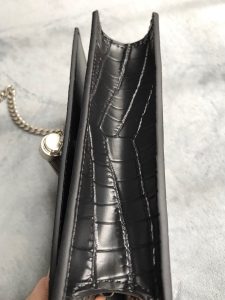 SAINT LAURENT Small 'Kate' Bag with Tassel. Authentic quality luxury bag crafted in genuine leather comes with authenticity card, dust bag and gift bag. Discover the epitome of elegance. Elegantly designed, the Monogram SAINT LAURENT bag is embellished with a sleek curb chain, interlocking YSL initials in metal, and a shimmering metallic tassel. Meticulously crafted from supple leather, the Kate shoulder bag by Saint Laurent showcases a distinctive YSL monogram plaque and a dangling tassel detail on the front, adding an exquisite touch. This exquisite accessory is ideal for a night out, serving as the perfect go-to option. It features a chain shoulder strap, a secure foldover top with magnetic closure, a spacious main compartment, an internal slip pocket, a logo patch, a logo stamp, and exquisite metal hardware for a sophisticated finish.
