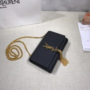 SAINT LAURENT Small 'Kate' Bag with Tassel. Authentic quality luxury bag crafted in genuine leather comes with authenticity card, dust bag and gift bag. Discover the epitome of elegance. Elegantly designed, the Monogram SAINT LAURENT bag is embellished with a sleek curb chain, interlocking YSL initials in metal, and a shimmering metallic tassel. Meticulously crafted from supple leather, the Kate shoulder bag by Saint Laurent showcases a distinctive YSL monogram plaque and a dangling tassel detail on the front, adding an exquisite touch. This exquisite accessory is ideal for a night out, serving as the perfect go-to option. It features a chain shoulder strap, a secure foldover top with magnetic closure, a spacious main compartment, an internal slip pocket, a logo patch, a logo stamp, and exquisite metal hardware for a sophisticated finish. - KRIS + KIKO SAINT LAURENT Small 'Kate' Bag with Tassel. Authentic quality luxury bag crafted in genuine leather comes with authenticity card, dust bag and gift bag. Discover the epitome of elegance. Elegantly designed, the Monogram SAINT LAURENT bag is embellished with a sleek curb chain, interlocking YSL initials in metal, and a shimmering metallic tassel. Meticulously crafted from supple leather, the Kate shoulder bag by Saint Laurent showcases a distinctive YSL monogram plaque and a dangling tassel detail on the front, adding an exquisite touch. This exquisite accessory is ideal for a night out, serving as the perfect go-to option. It features a chain shoulder strap, a secure foldover top with magnetic closure, a spacious main compartment, an internal slip pocket, a logo patch, a logo stamp, and exquisite metal hardware for a sophisticated finish.
