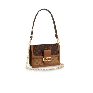 LOUIS VUITTON Dauphine MM Shoulder Bag. Authentic quality luxury bag crafted in genuine leather comes with authenticity card, dust bag and gift bag. A Modern Must-Have. Nicolas Ghesquière presents a captivating addition to the Spring-Summer 2019 collection: the Dauphine Mini handbag. This charming and sleek design is exquisitely crafted using Monogram and Monogram Reverse canvas, elegantly accentuated with smooth tan calfskin trim. The striking LV lock and leather smart strap bring a contemporary touch to this iconic piece, perfectly sized for seamless transitions from day to night. - KRIS + KIKO LOUS VUITTON Dauphine MM Shoulder Bag. Original Quality Bag. Authentic Style. Genuine Calf Leather. Metal Hardware. Authentic Packaging. Original Quality Dust Bag. For Spring-Summer 2019 Nicolas Ghesquière unveils a new must-have: the Dauphine Mini handbag. This adorable compact model is crafted from Monogram and Monogram Reverse canvas, trimmed with smooth tan calfskin. The high-shine LV lock and leather smart strap add a modern twist to this signature piece, which is perfectly sized for day-to-evening wear.