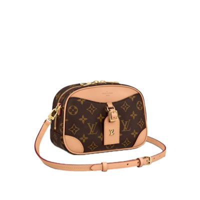 LOUIS VUITTON Deauville Mini Bag. Original Quality Bag including gift box, care book, dust bag, authenticity card. For Fall-Winter 2020, Nicolas Ghesquière introduces the Deauville Mini handbag. This adorable camera bag in Monogram canvas with natural leather trim will bring a touch of retro chic to any look. Compact and lightweight, it has an adjustable leather strap for shoulder and cross-body carry.