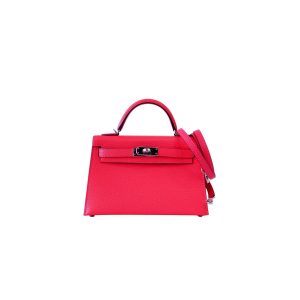 HERMÈS 'Mini Kelly’ Sellier II Leather Shoulder Bag. Authentic quality luxury bag crafted in genuine leather comes with authenticity card, dust bag and gift bag. Style meets functionality. Hermès has ingeniously crafted the ideal Kelly bag that strikes the perfect balance. Slightly larger than the sought-after baby Kelly Micro and smaller than the timeless classic Kelly, this exquisite creation effortlessly accommodates our modern gadgets, including our beloved smartphones, without compromising its charming and petite character. While it may not serve the exact purpose that earned it its name (as Grace Kelly famously concealed her baby bump with the bag in the 1950s), we wholeheartedly cherish it nonetheless. Today, embracing and showcasing our modern baby bellies is the new trend, after all.t-1.47.55-PM-copy - KRIS + KIKO HERMÈS 'Mini Kelly’ Sellier II Leather Shoulder Bag. Original Quality Bag. Metal toned Hardware. HERMÈS Sales Box and Dust Bag. Booklet, Authenticity Card, Payment Slip. Lock, keys, clochette. Hermès has created the perfect Kelly. Just a little bigger than the covetable baby Kelly Micro and smaller than the beautifully classic Kelly, it's been made to fit all our modern contraptions—smart phones included—while maintaining its petite insouciance. It may not be able to be utilized the same way it got its name (Grace Kelly famously held the bag over her body in photos to conceal her baby bump in the 1950s), but we love it just the same. Modern baby bellies are for flaunting, anyway.