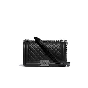 CHANEL Boy Quilted Leather Flap Bag. Authentic quality luxury bag crafted in genuine leather comes with authenticity card, dust bag and gift bag. Unveil Elegance: Elevate Your Style with CHANEL's Iconic Quilted Flap Bag. Elegantly designed, this exceptional CHANEL Boy quilted flap bag boasts a striking chain-link strap with a comfortable shoulder pad, a distinctive CC Boy logo push-lock closure, and exquisite antiqued hardware accents. Opening the push-lock closure reveals a luxurious black fabric-lined interior, complete with convenient side zip and slip pockets, perfect for securely organizing one's daily necessities. - KRIS + KIKO CHANEL Boy Quilted Leather Flap Bag. Original Quality Bag including gift box, literature, dust bag, authenticity card. This stand-out, enviable CHANEL Boy quilted flap bag features a chunky chain-link strap with shoulder pad, CC Boy logo push-lock closure, and antiqued hardware accents. Its push-lock closure opens to a black fabric-lined interior with side zip and slip pockets to secure daily essentials.