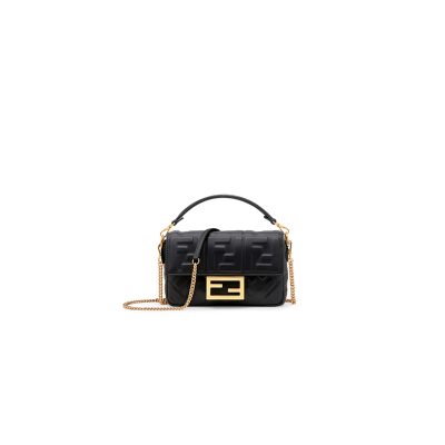 FENDI Baguette Mini. Original Quality Bag including gift box, literature, dust bag, authenticity card. The original It Bag is back. As the trend for everything the Nineties rolls on, it’s only right that Fendi’s iconic Baguette bag, which was created in 1997, has another turn in the spotlight. At the time, the Baguette quickly transcended any previous bag trends and became a phenomenon with women desperate to own as many designs as possible. There had never been such a fashionable yet high-end bag - yes, there were classics like Chanel’s 2.55 and Hermes’ Kelly and Birkin styles but the Baguette was new and fashion-led.