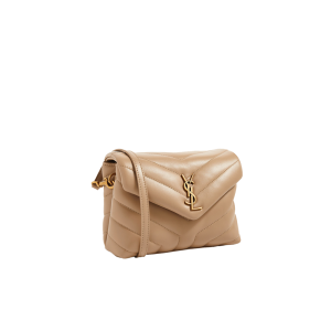 SAINT LAURENT Toy Loulou Matelassé Mini Bag. Authentic quality luxury bag crafted in genuine leather comes with authenticity card, dust bag and gift bag. Embrace Your Inner Rock and Roll Chic. The SAINT LAURENT Toy Loulou Matelassé Mini Bag can be described as a beautifully feminine accessory with a touch of rebellious charm. Its standout feature is the padded quilted leather, which adds volume and texture. The leather chain handles and metal interlocking YSL initials on the front flap give the bag a daring yet timeless allure, making it a luxurious statement piece. The versatility of the YSL LouLou bag is truly impressive, as it can effortlessly transition from casual to formal occasions. The adjustable chain strap allows for the option of wearing it as a crossbody bag, adding to its adaptability. - KRIS + KIKO SAINT LAURENT Toy Loulou Matelassé Mini Bag. If asked to describe the design of the SAINT LAURENT Toy Loulou Matelassé Mini Bag in a few words, we’d say that it is a feminine bag with a slight rock and roll feel to it. One of the most noticeable things about the look of the LouLou is the padded quilted leather, a feature which gives the bag more volume. The leather padded chain handles and the metal interlocking YSL initials on the front flap, make it a bold, yet still classic, luxury handbag. Versatility is another strong point of the YSL LouLou bag, and it can definitely be dressed up or down for any occasion. The chain strap is moveable, which means it can also be worn as a crossbody bag.