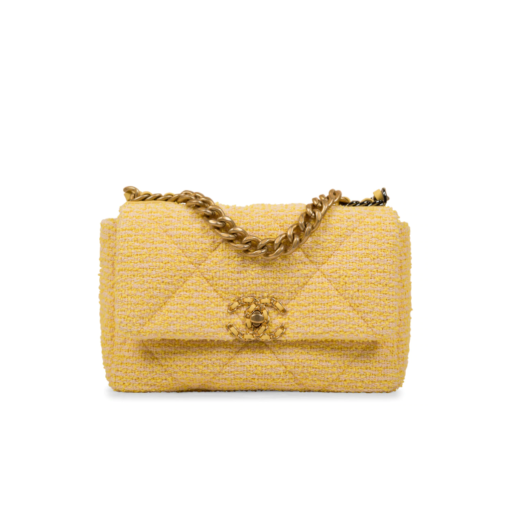 CHANEL 19 Flap Bag. Authentic quality luxury bag crafted in genuine leather comes with authenticity card, dust bag and gift bag. Effortlessly timeless, delightfully on-trend. For an everlasting touch of Parisian elegance, investing in a Chanel flap bag is the ultimate choice. However, if you're looking for a bag that seamlessly blends timeless appeal with current trends, then the Chanel 19 Flap Bag is the absolute pinnacle and arguably the most coveted bag in the world right now. Crafted with meticulous attention to detail using exquisite Tweed Fibres and adorned with the iconic two-toned Chanel 19 hardware in both Gold and Ruthenium, this icon is undeniably a striking fashion statement. The interwoven chain gracefully drapes over your shoulder or can be doubled up on your arm, exuding a sophisticated charm. Under the visionary craftsmanship of Karl Lagerfeld, Chanel stays true to its heritage by introducing classic quilted bags with a contemporary edge. Versatility is the name of the game as this exquisite piece effortlessly complements any ensemble you can imagine.
