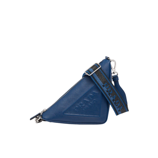 PRADA Saffiano Triangle Bag. Authentic quality luxury bag crafted in genuine leather comes with authenticity card, dust bag and gift bag. Artistry Meets Sustainability in Every Stitch. Crafted from Saffiano leather, a distinguished material recognized for its signature crosshatched pattern and waxed coating, this triangle-shaped bag epitomizes Prada's iconic geometric design. The emblematic triangle logo is skillfully embossed on the front, adding a touch of artistry. To further enhance the impeccable craftsmanship, the bag incorporates a Re-Nylon lining, a cutting-edge fabric crafted from regenerated nylon yarn. This exquisite combination of style and sustainability beautifully completes the overall design.