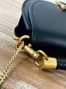CHLOÉ Marcie Chain Flap Bag. Authentic quality luxury bag crafted in genuine leather comes with authenticity card, dust bag and gift bag. Elevating Iconic Elegance: Marcie Line Redefined. Experience a fresh take on Chloé's iconic Marcie line with this exquisite chain flap bag, meticulously crafted from a captivating blend of nappa lambskin, grained calfskin, and sumptuous suede. The line's signature hardware undergoes a graceful transformation, now adorned with Chloé's engraved jewelry hallmark, adorning the flap with sophistication. An intricately hand-braided top handle pays homage to another hallmark Marcie feature, while a gracefully extended chain strap adds a refined touch. Whether you choose to drape it over your shoulder or wear it cross-body during the day, or opt to detach the strap and carry it by hand for a sophisticated evening ensemble, this flap bag is a versatile masterpiece. Chloé's Marcie bag line effortlessly melds a feminine aesthetic with the free-spirited vibe of the '70s. An equestrian-inspired allure takes center stage, elevated by the allure of gleaming gold-toned hardware, resulting in a distinctly feminine yet timelessly chic look. - KRIS + KIKO CHLOÉ Marcie Chain Flap Bag. Authentic quality luxury bag crafted in genuine leather comes with authenticity card, dust bag and gift bag. Elevating Iconic Elegance: Marcie Line Redefined. Experience a fresh take on Chloé's iconic Marcie line with this exquisite chain flap bag, meticulously crafted from a captivating blend of nappa lambskin, grained calfskin, and sumptuous suede. The line's signature hardware undergoes a graceful transformation, now adorned with Chloé's engraved jewelry hallmark, adorning the flap with sophistication. An intricately hand-braided top handle pays homage to another hallmark Marcie feature, while a gracefully extended chain strap adds a refined touch. Whether you choose to drape it over your shoulder or wear it cross-body during the day, or opt to detach the strap and carry it by hand for a sophisticated evening ensemble, this flap bag is a versatile masterpiece. Chloé's Marcie bag line effortlessly melds a feminine aesthetic with the free-spirited vibe of the '70s. An equestrian-inspired allure takes center stage, elevated by the allure of gleaming gold-toned hardware, resulting in a distinctly feminine yet timelessly chic look.