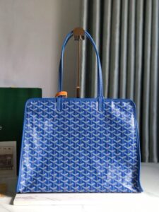GOYARD Hardy PM Bag. Authentic quality luxury bag crafted in genuine leather comes with authenticity card, dust bag and gift bag. Effortless Elegance, Everyday Function. The Hardy PM bag is the perfect companion for everyday use or work, easily fitting A4 files with ease. Designed for those who value lightness, flexibility, and added security, it features a zip closure to keep your essentials safe. With long, comfortable handles, it's ideal for carrying over the shoulder all day with ease. - KRIS + KIKO GOYARD Hardy PM Bag. Authentic quality luxury bag crafted in genuine leather comes with authenticity card, dust bag and gift bag. Effortless Elegance, Everyday Function. The Hardy PM bag is the perfect companion for everyday use or work, easily fitting A4 files with ease. Designed for those who value lightness, flexibility, and added security, it features a zip closure to keep your essentials safe. With long, comfortable handles, it's ideal for carrying over the shoulder all day with ease.