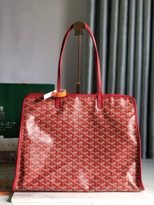 GOYARD Hardy PM Bag. Authentic quality luxury bag crafted in genuine leather comes with authenticity card, dust bag and gift bag. Effortless Elegance, Everyday Function. The Hardy PM bag is the perfect companion for everyday use or work, easily fitting A4 files with ease. Designed for those who value lightness, flexibility, and added security, it features a zip closure to keep your essentials safe. With long, comfortable handles, it's ideal for carrying over the shoulder all day with ease.