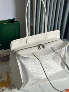 GOYARD Hardy PM Bag. Authentic quality luxury bag crafted in genuine leather comes with authenticity card, dust bag and gift bag. Effortless Elegance, Everyday Function. The Hardy PM bag is the perfect companion for everyday use or work, easily fitting A4 files with ease. Designed for those who value lightness, flexibility, and added security, it features a zip closure to keep your essentials safe. With long, comfortable handles, it's ideal for carrying over the shoulder all day with ease. - KRIS + KIKO GOYARD Hardy PM Bag. Authentic quality luxury bag crafted in genuine leather comes with authenticity card, dust bag and gift bag. Effortless Elegance, Everyday Function. The Hardy PM bag is the perfect companion for everyday use or work, easily fitting A4 files with ease. Designed for those who value lightness, flexibility, and added security, it features a zip closure to keep your essentials safe. With long, comfortable handles, it's ideal for carrying over the shoulder all day with ease.