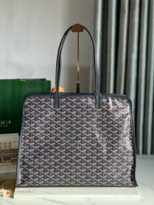 GOYARD Hardy PM Bag. Authentic quality luxury bag crafted in genuine leather comes with authenticity card, dust bag and gift bag. Effortless Elegance, Everyday Function. The Hardy PM bag is the perfect companion for everyday use or work, easily fitting A4 files with ease. Designed for those who value lightness, flexibility, and added security, it features a zip closure to keep your essentials safe. With long, comfortable handles, it's ideal for carrying over the shoulder all day with ease. - KRIS + KIKO GOYARD Hardy PM Bag. Authentic quality luxury bag crafted in genuine leather comes with authenticity card, dust bag and gift bag. Effortless Elegance, Everyday Function. The Hardy PM bag is the perfect companion for everyday use or work, easily fitting A4 files with ease. Designed for those who value lightness, flexibility, and added security, it features a zip closure to keep your essentials safe. With long, comfortable handles, it's ideal for carrying over the shoulder all day with ease.