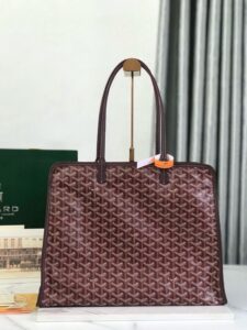 GOYARD Hardy PM Bag. Authentic quality luxury bag crafted in genuine leather comes with authenticity card, dust bag and gift bag. Effortless Elegance, Everyday Function. The Hardy PM bag is the perfect companion for everyday use or work, easily fitting A4 files with ease. Designed for those who value lightness, flexibility, and added security, it features a zip closure to keep your essentials safe. With long, comfortable handles, it's ideal for carrying over the shoulder all day with ease. - KRIS + KIKO GOYARD Hardy PM Bag. Authentic quality luxury bag crafted in genuine leather comes with authenticity card, dust bag and gift bag. Effortless Elegance, Everyday Function. The Hardy PM bag is the perfect companion for everyday use or work, easily fitting A4 files with ease. Designed for those who value lightness, flexibility, and added security, it features a zip closure to keep your essentials safe. With long, comfortable handles, it's ideal for carrying over the shoulder all day with ease.