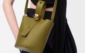 A clean, minimalist product shot of the Mini Pebble Bucket Bag by KRIS & KIKO