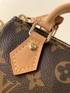 LOUIS VUITTON Speedy Nano. Authentic quality luxury bag crafted in genuine leather comes with authenticity card, dust bag and gift bag. Iconic Style, Perfectly Miniaturized. Meet the LOUIS VUITTON Speedy Nano— a petite powerhouse that captures the timeless allure of the iconic Speedy in its most charming form. Revamped in classic Monogram canvas and finished with aged natural cowhide leather, this mini marvel is made for the modern minimalist. Crafted with delicate gold-tone hardware and featuring two signature top handles, the Speedy Nano is both playful and practical. Its removable, adjustable shoulder strap adds effortless versatility—carry it by hand for polished poise or sling it crossbody for chic, on-the-go ease. Compact enough for your essentials. Iconic enough to turn heads. Small bag, big legacy! - KRIS + KIKO LOUIS VUITTON Speedy Nano. Authentic quality luxury bag crafted in genuine leather comes with authenticity card, dust bag and gift bag. Iconic Style, Perfectly Miniaturized. Meet the LOUIS VUITTON Speedy Nano— a petite powerhouse that captures the timeless allure of the iconic Speedy in its most charming form. Revamped in classic Monogram canvas and finished with aged natural cowhide leather, this mini marvel is made for the modern minimalist. Crafted with delicate gold-tone hardware and featuring two signature top handles, the Speedy Nano is both playful and practical. Its removable, adjustable shoulder strap adds effortless versatility—carry it by hand for polished poise or sling it crossbody for chic, on-the-go ease. Compact enough for your essentials. Iconic enough to turn heads. Small bag, big legacy!