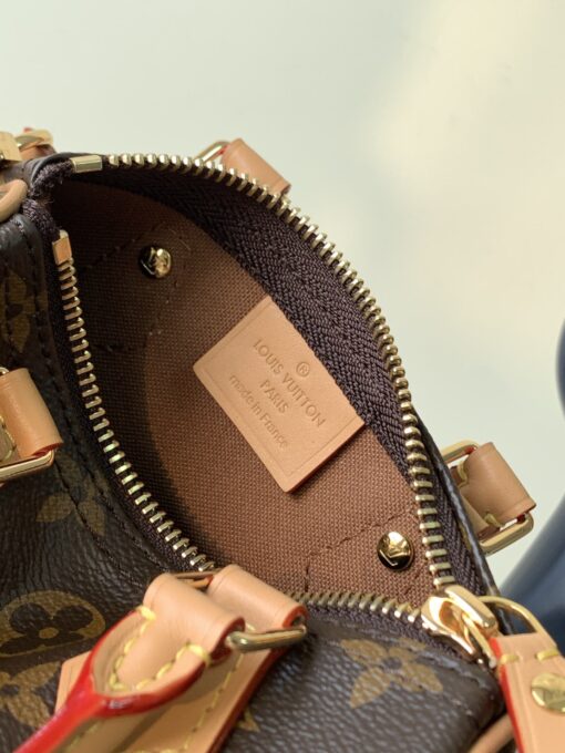 LOUIS VUITTON Speedy Nano. Authentic quality luxury bag crafted in genuine leather comes with authenticity card, dust bag and gift bag. Iconic Style, Perfectly Miniaturized. Meet the LOUIS VUITTON Speedy Nano— a petite powerhouse that captures the timeless allure of the iconic Speedy in its most charming form. Revamped in classic Monogram canvas and finished with aged natural cowhide leather, this mini marvel is made for the modern minimalist. Crafted with delicate gold-tone hardware and featuring two signature top handles, the Speedy Nano is both playful and practical. Its removable, adjustable shoulder strap adds effortless versatility—carry it by hand for polished poise or sling it crossbody for chic, on-the-go ease. Compact enough for your essentials. Iconic enough to turn heads. Small bag, big legacy!