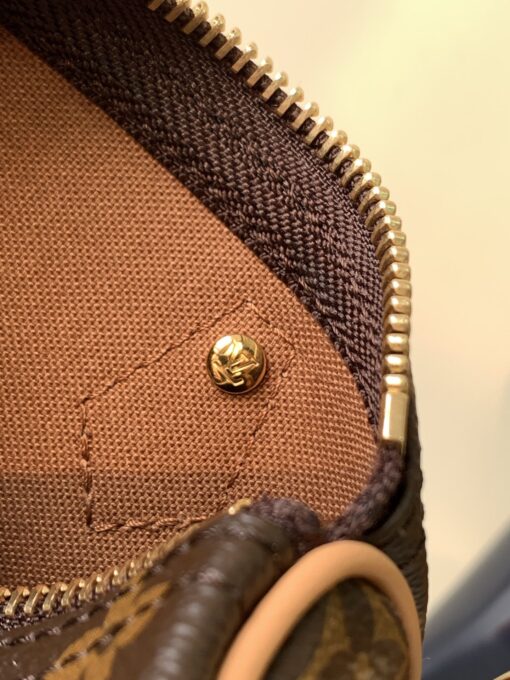 LOUIS VUITTON Speedy Nano. Authentic quality luxury bag crafted in genuine leather comes with authenticity card, dust bag and gift bag. Iconic Style, Perfectly Miniaturized. Meet the LOUIS VUITTON Speedy Nano— a petite powerhouse that captures the timeless allure of the iconic Speedy in its most charming form. Revamped in classic Monogram canvas and finished with aged natural cowhide leather, this mini marvel is made for the modern minimalist. Crafted with delicate gold-tone hardware and featuring two signature top handles, the Speedy Nano is both playful and practical. Its removable, adjustable shoulder strap adds effortless versatility—carry it by hand for polished poise or sling it crossbody for chic, on-the-go ease. Compact enough for your essentials. Iconic enough to turn heads. Small bag, big legacy!