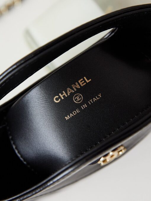 CHANEL 31 Nano Shopping Bag. Authentic quality luxury bag crafted in genuine leather comes with authenticity card, dust bag and gift bag. Small in size, grand in statement. A miniature marvel that captures the sophistication of CHANEL in its most playful form. Crafted with meticulous precision, this petite icon merges the timeless spirit of the CHANEL 31 with a modern twist on everyday elegance. Designed in supple lambskin and finished with gleaming gold-tone hardware, the Nano 31 doesn’t just carry your essentials — it carries your attitude. Whether worn crossbody, by hand, or dangling from the crook of your arm, this charming piece elevates every ensemble with a whisper of Parisian chic. Perfect for a night out or a day in the spotlight, it’s not just a bag — it’s your boldest accessory in its most compact form. Because luxury doesn't need to shout. Sometimes, it just needs to charm.