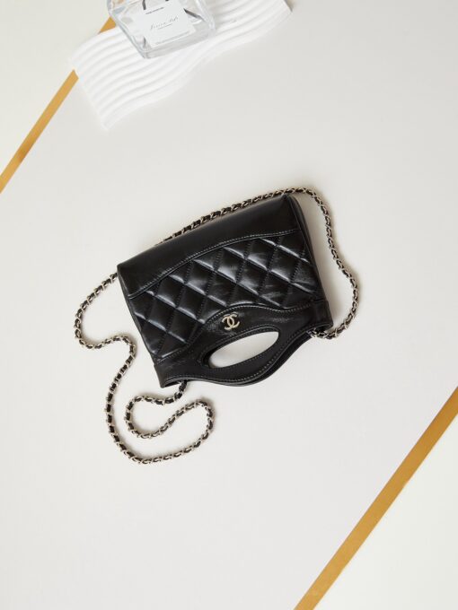 CHANEL 31 Nano Shopping Bag. Authentic quality luxury bag crafted in genuine leather comes with authenticity card, dust bag and gift bag. Small in size, grand in statement. A miniature marvel that captures the sophistication of CHANEL in its most playful form. Crafted with meticulous precision, this petite icon merges the timeless spirit of the CHANEL 31 with a modern twist on everyday elegance. Designed in supple lambskin and finished with gleaming gold-tone hardware, the Nano 31 doesn’t just carry your essentials — it carries your attitude. Whether worn crossbody, by hand, or dangling from the crook of your arm, this charming piece elevates every ensemble with a whisper of Parisian chic. Perfect for a night out or a day in the spotlight, it’s not just a bag — it’s your boldest accessory in its most compact form. Because luxury doesn't need to shout. Sometimes, it just needs to charm.