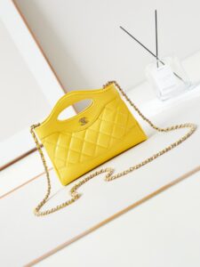 CHANEL 31 Nano Shopping Bag. Authentic quality luxury bag crafted in genuine leather comes with authenticity card, dust bag and gift bag. Small in size, grand in statement. A miniature marvel that captures the sophistication of CHANEL in its most playful form. Crafted with meticulous precision, this petite icon merges the timeless spirit of the CHANEL 31 with a modern twist on everyday elegance. Designed in supple lambskin and finished with gleaming gold-tone hardware, the Nano 31 doesn’t just carry your essentials — it carries your attitude. Whether worn crossbody, by hand, or dangling from the crook of your arm, this charming piece elevates every ensemble with a whisper of Parisian chic. Perfect for a night out or a day in the spotlight, it’s not just a bag — it’s your boldest accessory in its most compact form. Because luxury doesn't need to shout. Sometimes, it just needs to charm. - KRIS + KIKO CHANEL 31 Nano Shopping Bag. Authentic quality luxury bag crafted in genuine leather comes with authenticity card, dust bag and gift bag. Small in size, grand in statement. A miniature marvel that captures the sophistication of CHANEL in its most playful form. Crafted with meticulous precision, this petite icon merges the timeless spirit of the CHANEL 31 with a modern twist on everyday elegance. Designed in supple lambskin and finished with gleaming gold-tone hardware, the Nano 31 doesn’t just carry your essentials — it carries your attitude. Whether worn crossbody, by hand, or dangling from the crook of your arm, this charming piece elevates every ensemble with a whisper of Parisian chic. Perfect for a night out or a day in the spotlight, it’s not just a bag — it’s your boldest accessory in its most compact form. Because luxury doesn't need to shout. Sometimes, it just needs to charm.